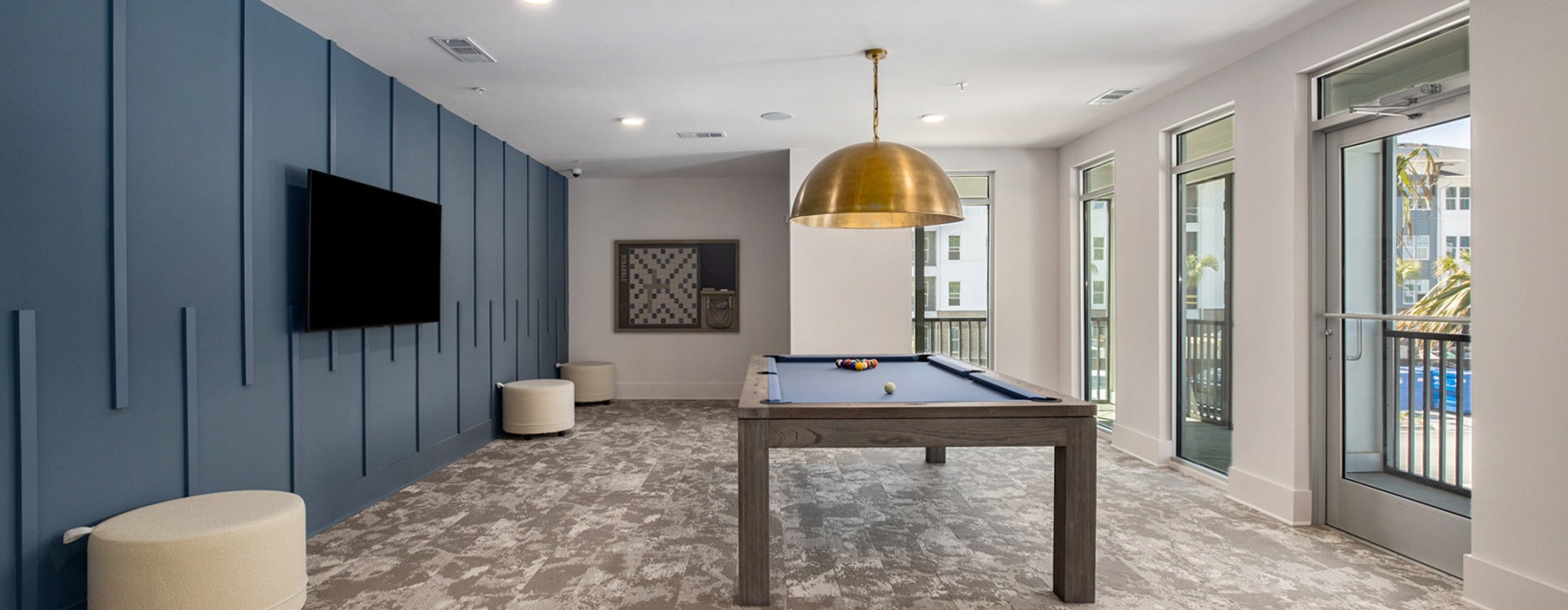 clubhouse pool table and ample lighting