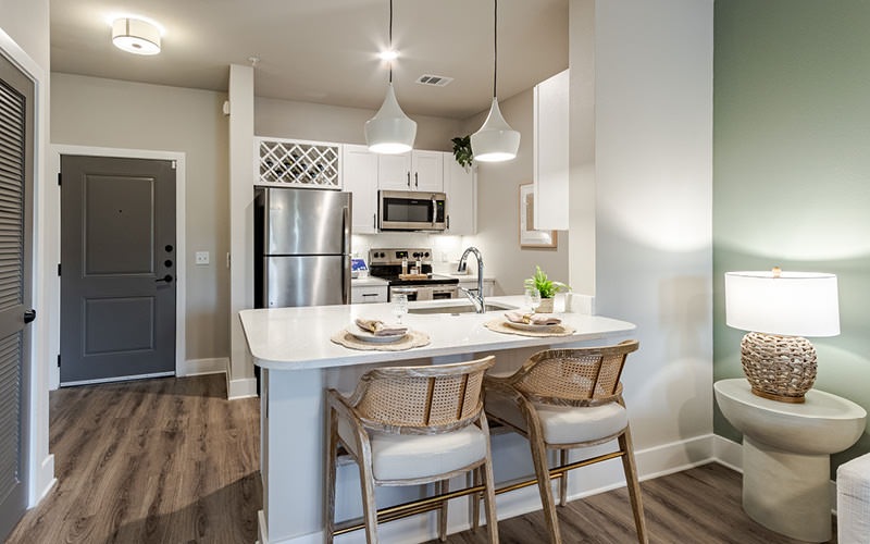 kitchen counter with chairs