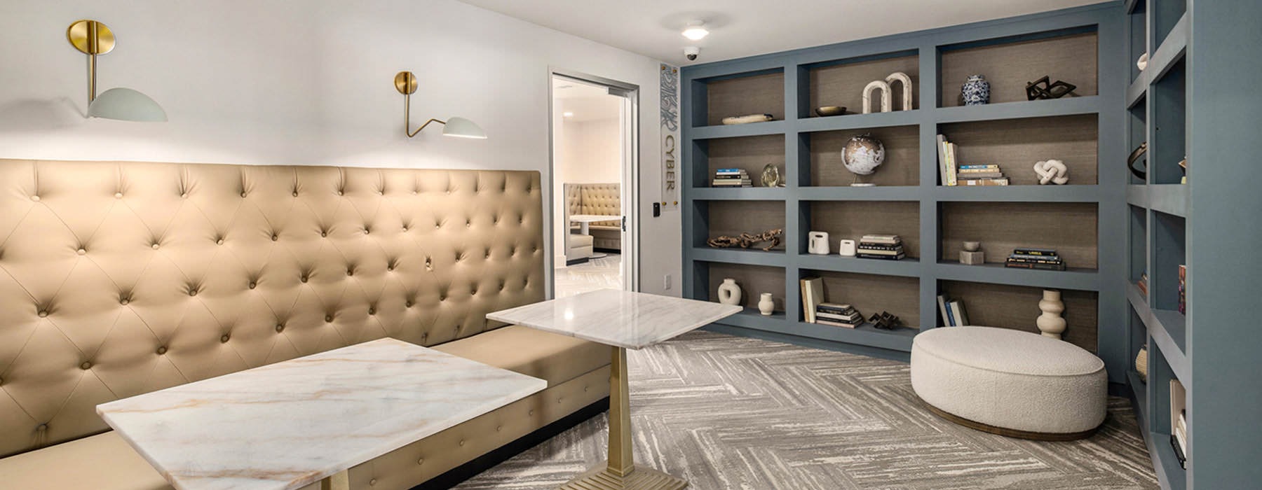 residents' lounge with bookshelves