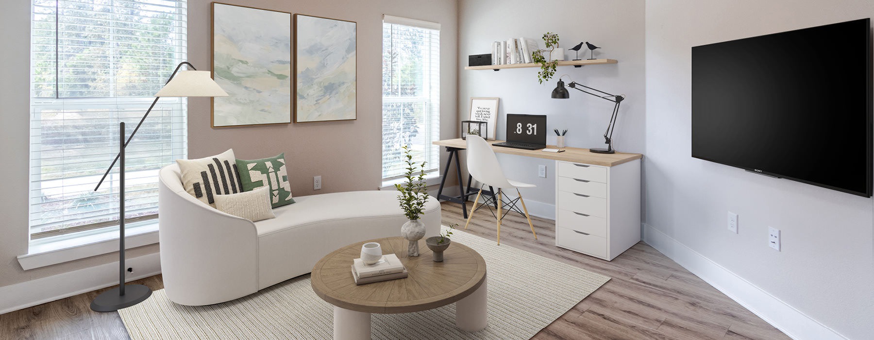 work space in living room with large windows