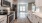 a kitchen with white cabinets