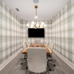 Conference Room well lit conference room with table and chairs